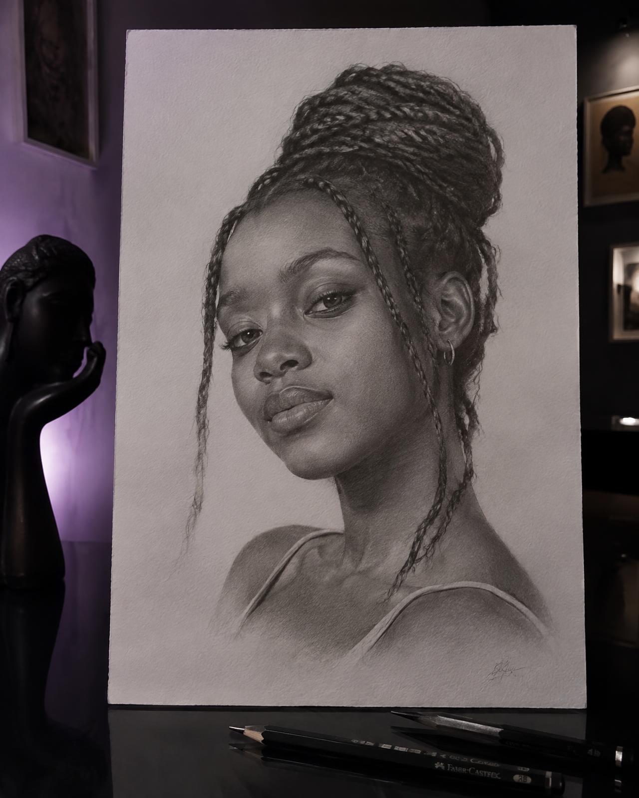 Sample pencil portrait of a young woman with braided hair